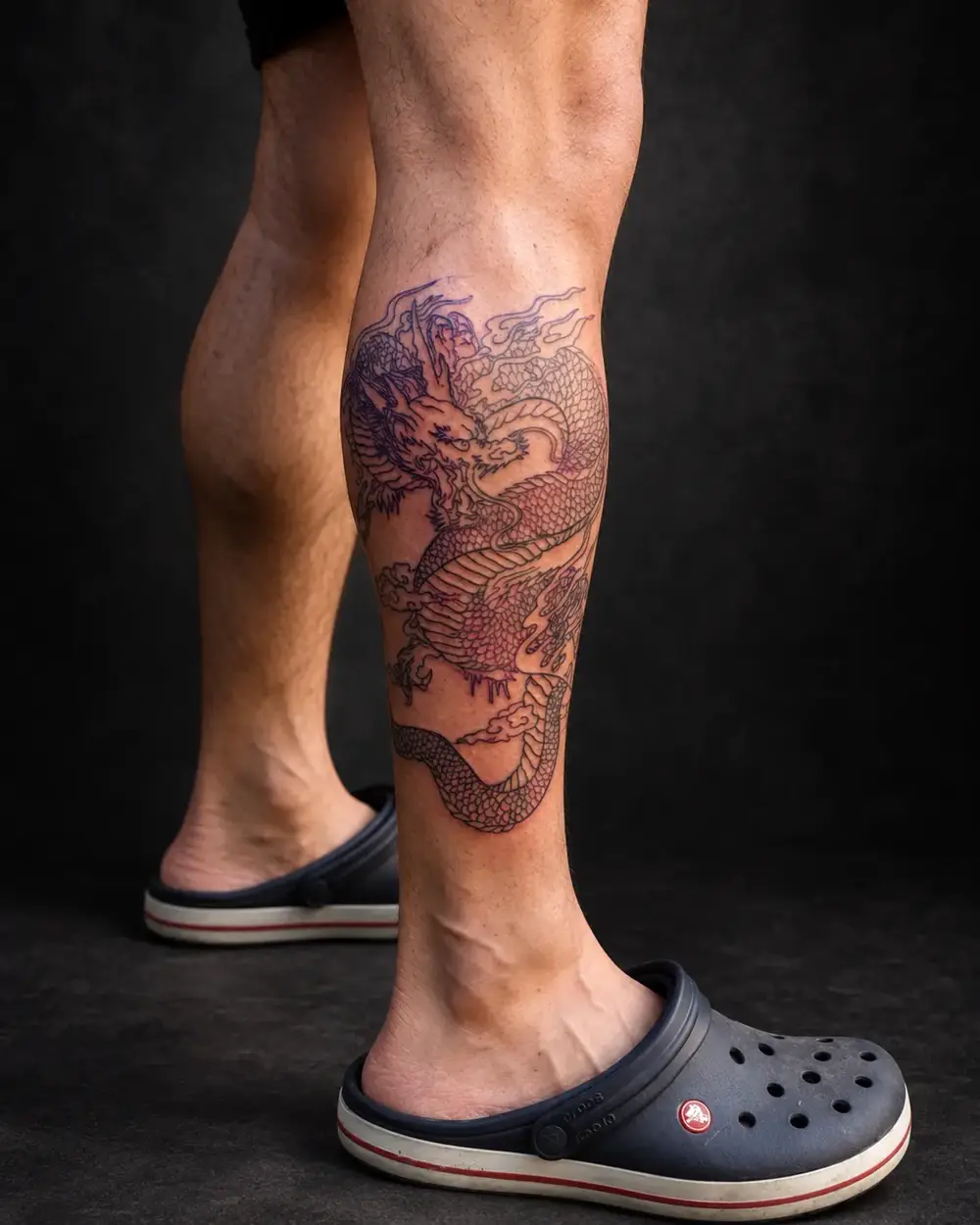 Tatuaje de dragón en la pierna en progreso por Lucca Haro, tatuador en Buenos Aires (CABA)